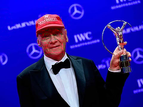  In this file photo taken on April 19, 2016 Austrian Formula One driver Niki Lauda poses with his trophy in the category Lifetime Achievement at the Laureus World Sports 2016 Awards Ceremony in Berlin. 