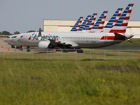 American Airlines Group Inc. Boeing Co. 737 Max planes sit parked at Tulsa International Airport (TUL) in Tulsa, Oklahoma. Boeing's best-selling jet was grounded worldwide in March 2019 after two crashes five months apart killed a combined 346 people.