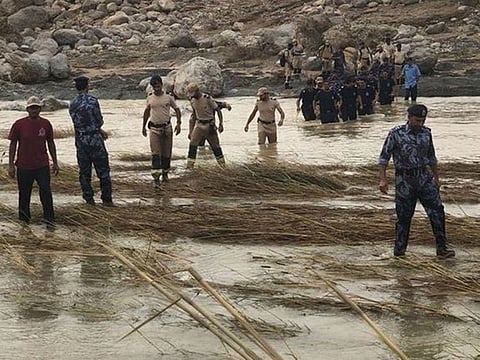 Royal Oman Police search for members of missing Indian family.