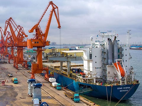 A ship unloading at the port in Qingdao, in China's eastern Shandong province.