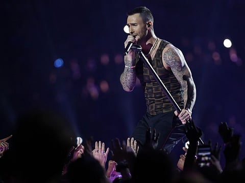 In this Feb. 3, 2019 file photo, Adam Levine, of Maroon 5, performs during halftime of the NFL Super Bowl 53 football game between the Los Angeles Rams and the New England Patriots in Atlanta. 