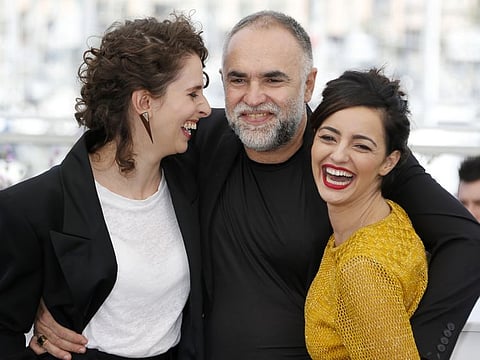 Photocall for the film "The Invisible Life of Euridice Gusmao" (A Vida Invisivel de Euridice Gusmao) in competition for the category Un Certain Regard - Cannes, France, May 20, 2019. Director Karim Ainouz and cast members Carol Duarte and Julia Stockler pose.