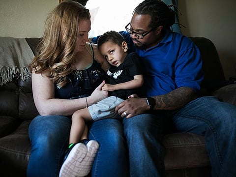 Malachi Anderson, now nearly 4, with his parents Tina and Torence, was diagnosed with spinal muscular atrophy at four months and received a new gene-therapy treatment recently, in Mansfield, Ohio.