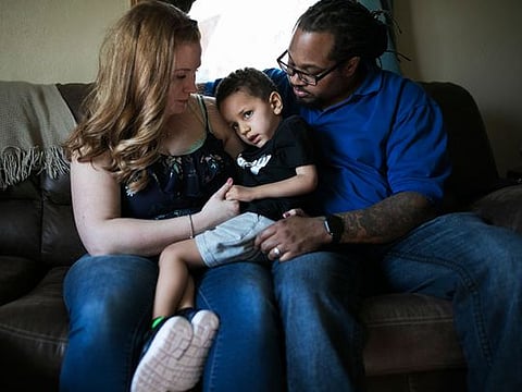 Malachi Anderson, now nearly 4, with his parents Tina and Torence, was diagnosed with spinal muscular atrophy at four months and received a new gene-therapy treatment recently, in Mansfield, Ohio.