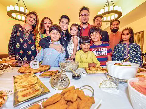 Zaheer Fasih and Bushra Athar with their friends who are like family during Iftar at their home in Discovery Garden, Dubai.