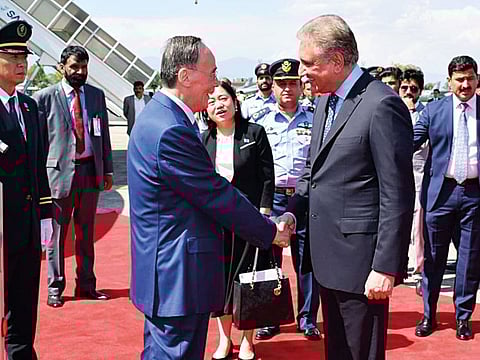 Foreign Minister Shah Mahmoud Quraishi receives Chinese Vice-President Wang Qishan at Nur Khan Airbase in Islamabad.