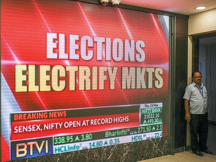 A screen with stock movements at the Bombay Stock Exchange in Mumbai