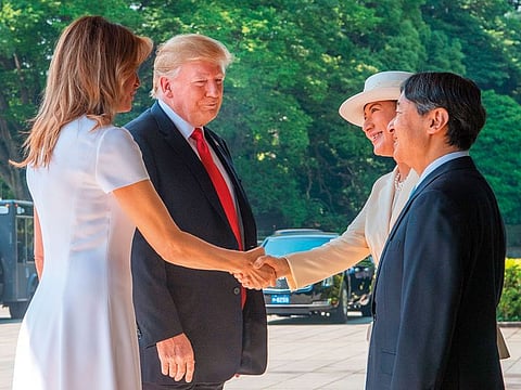 US First Lady Melania Trump and US President Donald Trump meet Japan Emperor Naruhito and Empress Masako during a welcome ceremony at the Imperial Palace in Tokyo on May 27, 2019. 