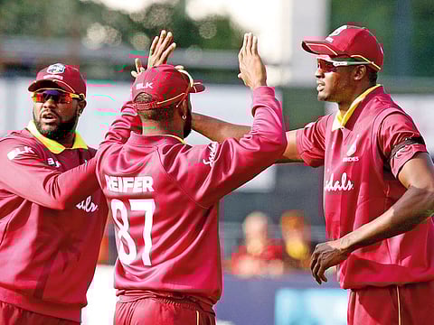 West Indies captain Jason Holder (right) feels the team defied the odds to win the World T20 Cup in 2016.