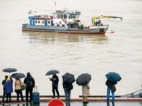 A sonar is being used at Margaret Bridge during a search operation on the River Danube in Budapest, Hungary, yesterday, following a collision of a hotel ship and a smaller cruise ship.