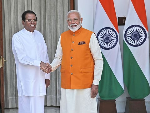 Indian Prime Minister Narendra Modi, right, shakes hands with Sri Lankan President Maithripala Sirisena before the start of their bilateral meeting in New Delhi, India, Friday, May 31, 2019. 