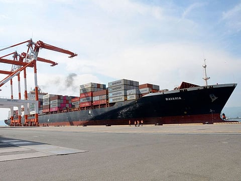 The cargo ship M/V Bavaria waits for loading of containers as it is docked at Subic port in Zambales province, northwestern Philippines, on Thursday. The Philippines shipped 69 containers of what it's officials called illegally transported garbage back to Canada. 
