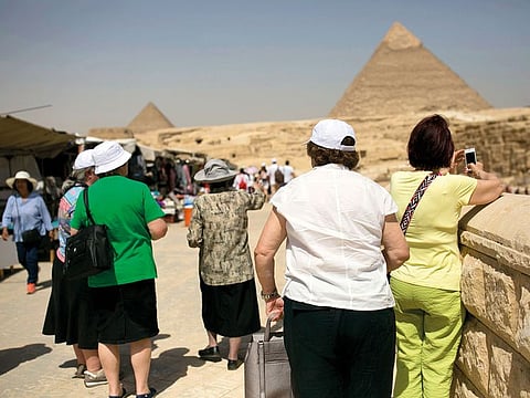 Tourists at the Giza Pyramids near Cairo.  On visas for Iranians arriving in South Sinai, home to the highly secured resort of Sharm Al Sheikh, Eisa said: “We will evaluate the experience of their arrival in South Sinai as a first step, and building on that, we’ll determine if they will be admitted in other places.” 