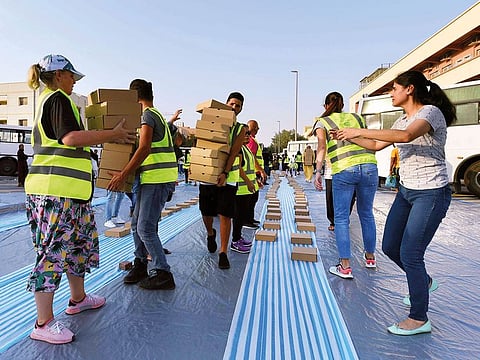 Berkeley Assets, in association with Dubai Police, arranged iftar meals at a labour camp in Dubai. Among those helping was United Nations Goodwill Ambassador Roy Fernandes.