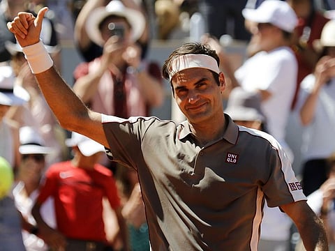 Switzerland's Roger Federer celebrates after winning against Argentina's Leonardo Mayer during their men's singles fourth round match on day eight of The Roland Garros 2019 French Open tennis tournament in Paris on June 2, 2019.