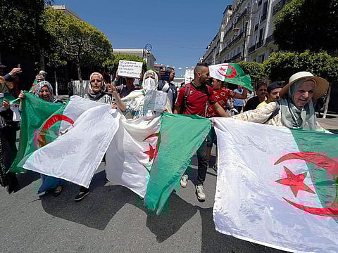 Algerian protesters gather during an anti-government demonstration in the centre of the capital Algiers, Algeria.