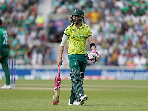 South Africa's captain Faf du Plessis walks off the field of play after losing his wicket from the bowling of Bangladesh's Mehedi Hasan.