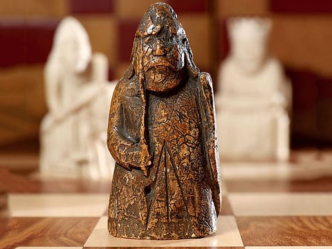 A Lewis Chessman on display at Sotheby's in London.