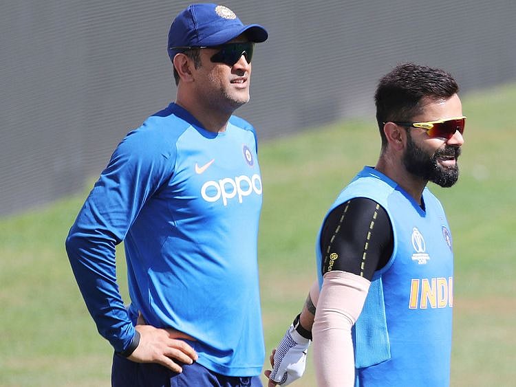 Virat Kohli and MS Dhoni attend a training session
