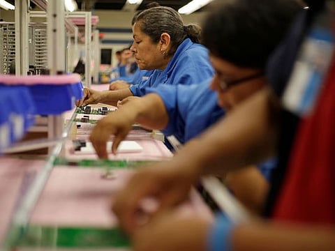 Employees of NDP Technology, a private company specialised in PCB (Printed Circuit Board) assembly for different industries, works on a printed circuit board in Ciudad Juarez, Mexico.