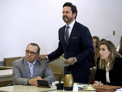 Actor Kevin Spacey, left, listens to attorney Alan Jackson address the court during a pretrial hearing.