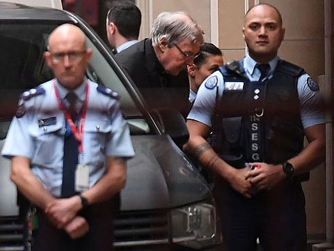 Cardinal George Pell arrives at the Supreme Court of Victoria in Melbourne, Australia.