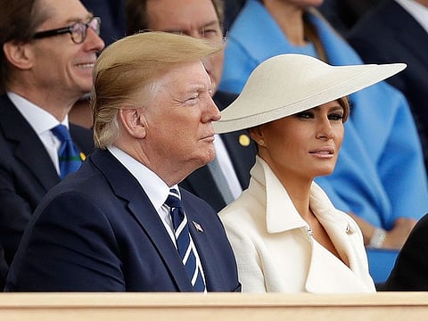 President Donald Trump and first lady Melania Trump attend an event to mark the 75th anniversary of D-Day in Portsmouth, England Wednesday, June 5, 2019. 