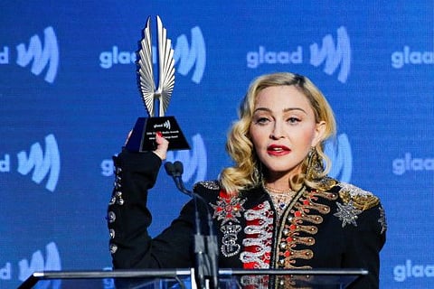 Singer Madonna holds up her Advocate for Change award during the 30th annual GLAAD awards ceremony in New York City, New York, U.S., May 4, 2019. 