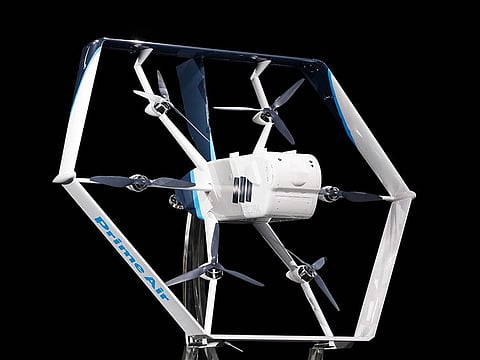 Amazon unveils its newest drone design for its "Prime Air" fleet at the Machine Learning, Automation, Robotics and Space conference "re: Mars" in Las Vegas on June 5, 2016.