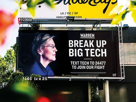 An Elizabeth Warren presidential campaign billboard hangs in the SOMA District of San Francisco.