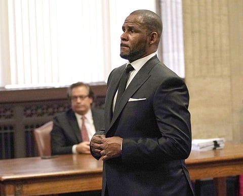 In this file photo taken on March 22, 2019 US music artist R. Kelly attends a hearing on his sex abuse case, at the George N. Leighton Criminal Court Building in Chicago, Illinois. 