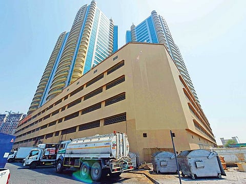 A tanker pumping water from the towers in Ajman.