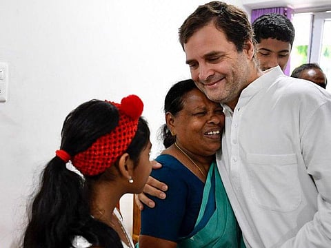 Congress President Rahul Gandhi meets Rajamma, who was his delivery nurse, at PWD Rest House Kalpetta, in Wayanad.