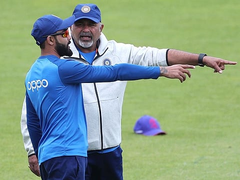 Ravindra Jadeja, left, interacts with team bowling coach Bharat Arun during a training session at The Oval in London. 