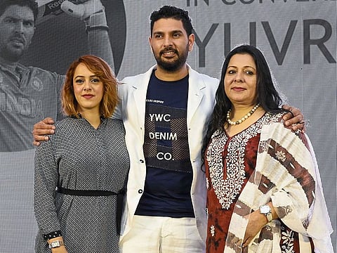 Yuvraj Singh with his mother Shabnam and wife Hazel Keech at the event 'In Conversation With Yuvraj Singh' in Mumbai, on Monday, June 10, 2019.  