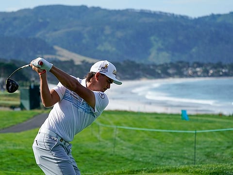 Rickie Fowler hits his tee shot on the 10th hole during a practice round for the US Open in Pebble Beach.