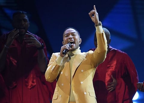 John Legend performs "Preach" at the iHeartRadio Music Awards on Thursday, March 14, 2019, at the Microsoft Theater in Los Angeles. (Photo by Chris Pizzello/Invision/AP)