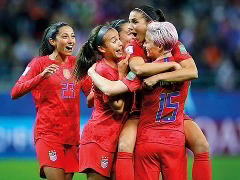 United States' Alex Morgan, second right, celebrates after scoring her side's 12th goal during the Women's World Cup Group F soccer match between United States and Thailand at the Stade Auguste-Delaune in Reims, France, Tuesday, June 11, 2019.
