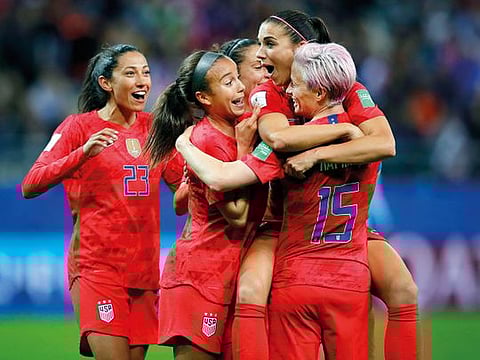 United States' Alex Morgan, second right, celebrates after scoring her side's 12th goal during the Women's World Cup Group F soccer match between United States and Thailand at the Stade Auguste-Delaune in Reims, France, Tuesday, June 11, 2019.