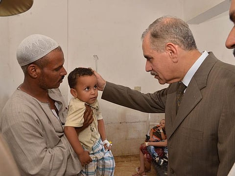 Governor of the Egyptian province of Assiut Jamal Nour Al Din Thursday visits a child who had been treated for food poisoning at a hospital in the southern province.