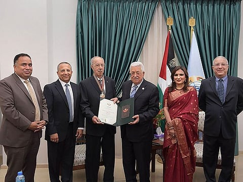 Palestinian President Mahmoud Abbas honours Indian origin Shaikh Mohammad Munir Ansari with the medal of Star of Jerusalem, in Jerusalem.