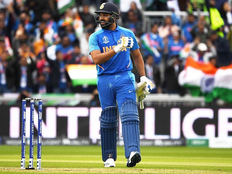 India's Rohit Sharma celebrates after scoring a century