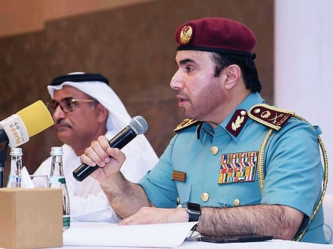 Maj Gen Al Risi and Saif Al Suwaidi address media in  Abu Dhabi.