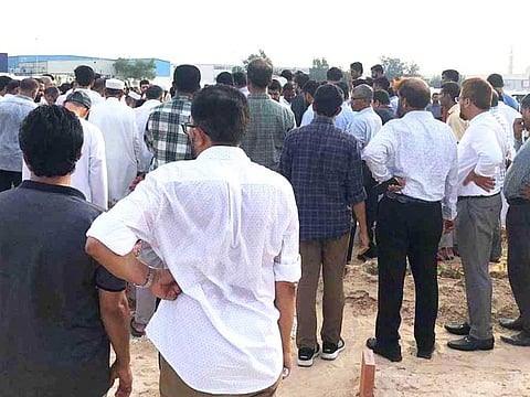 Relatives and friends attend the funeral for Mohammad Farhan. The Indian family were scheduled to fly home later this month for the wedding of their eldest daughter.