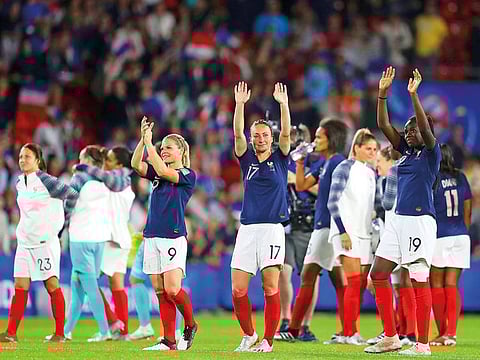 France players celebrate at the end of the Women’s World Cup Group A match between Nigeria and France.