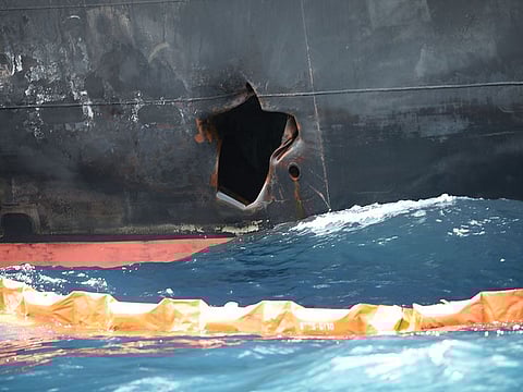A damage, made by a limpet mine, is seen on a Japanese-owned Kokuka Courageous tanker off the coast of Fujairah.