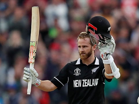 New Zealand's Kane Williamson celebrates a century.