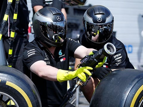 Mercedes mechanics working on Lewis Hamilton's car ahead of practice, at Circuit Paul Ricard, Le Castellet, in France. 
