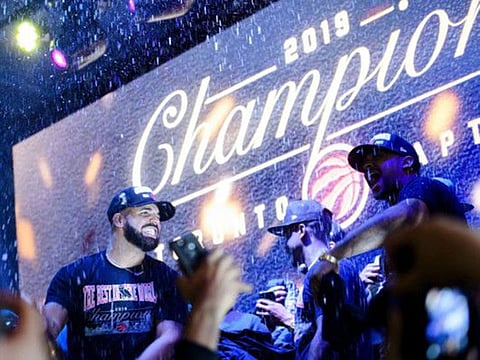 Drake reacts on stage in Jurassic Park near Scotiabank Arena in Toronto after the Toronto Raptors defeated the Golden State Warriors in Oakland, Calif., to win the NBA basketball championship Thursday, June 13, 2019. (Nathan Denette/The Canadian Press via AP)