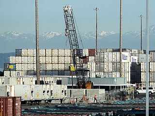 China to halve tariffs on some US imports as virus risks grow